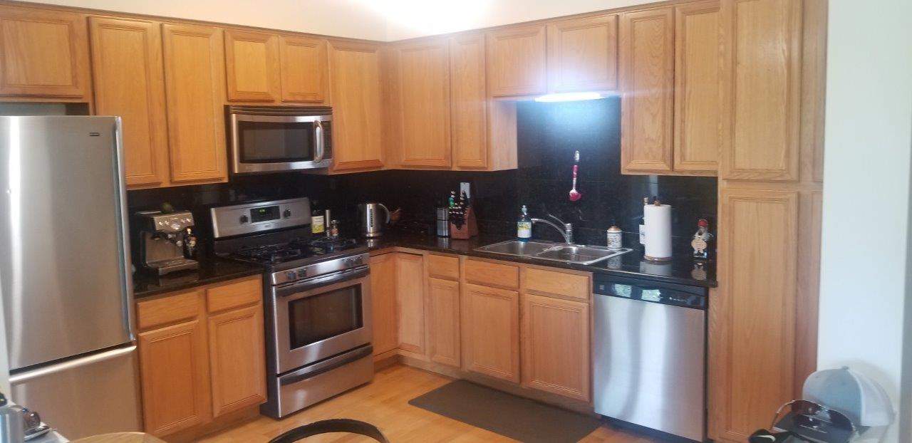 Kitchen Cabinets with Granite and Appliances