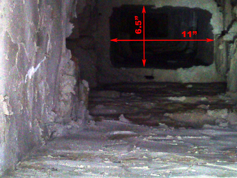 There is a narrow passage 6 feet below the top or the chimney (just below roof level) that measures 6.75 by 11 inches